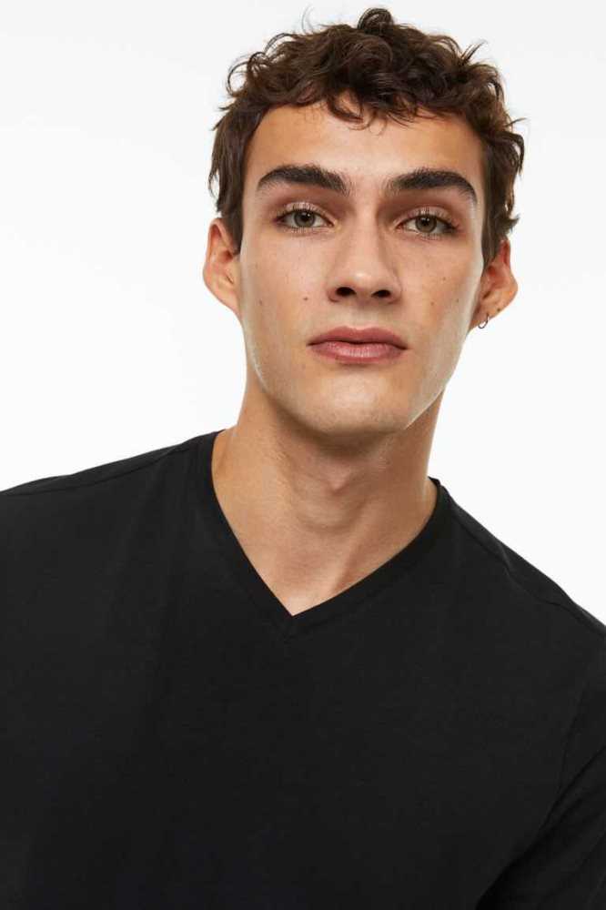 Camiseta H&M Slim Fit V-neck Hombre Negros | 492816EPA