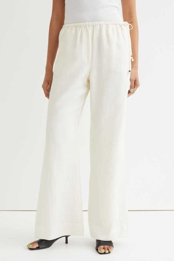 Pantalones H&M Flared Lyocell-blend Mujer Creme | 956810MLY