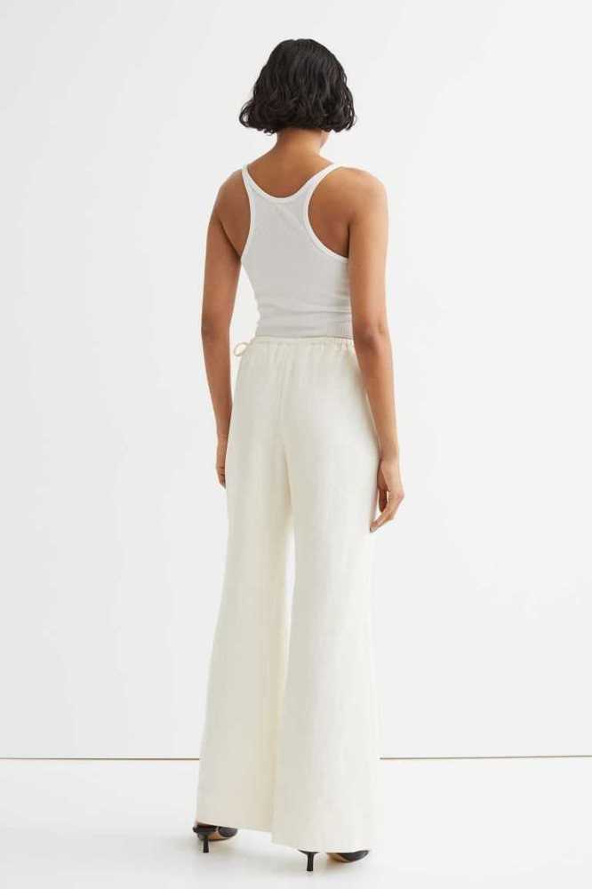 Pantalones H&M Flared Lyocell-blend Mujer Creme | 956810MLY