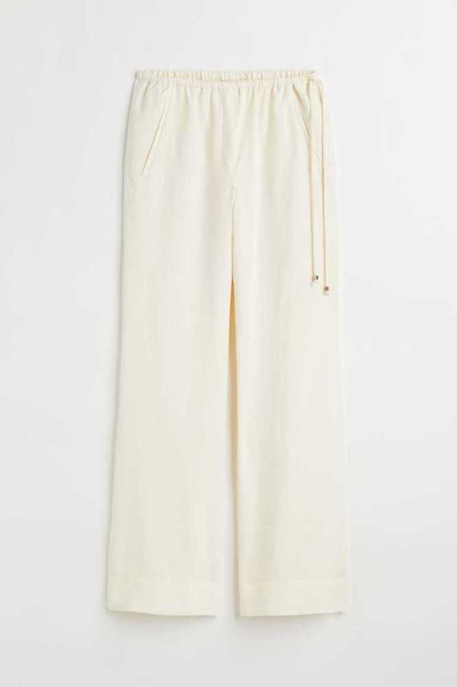 Pantalones H&M Flared Lyocell-blend Mujer Creme | 956810MLY