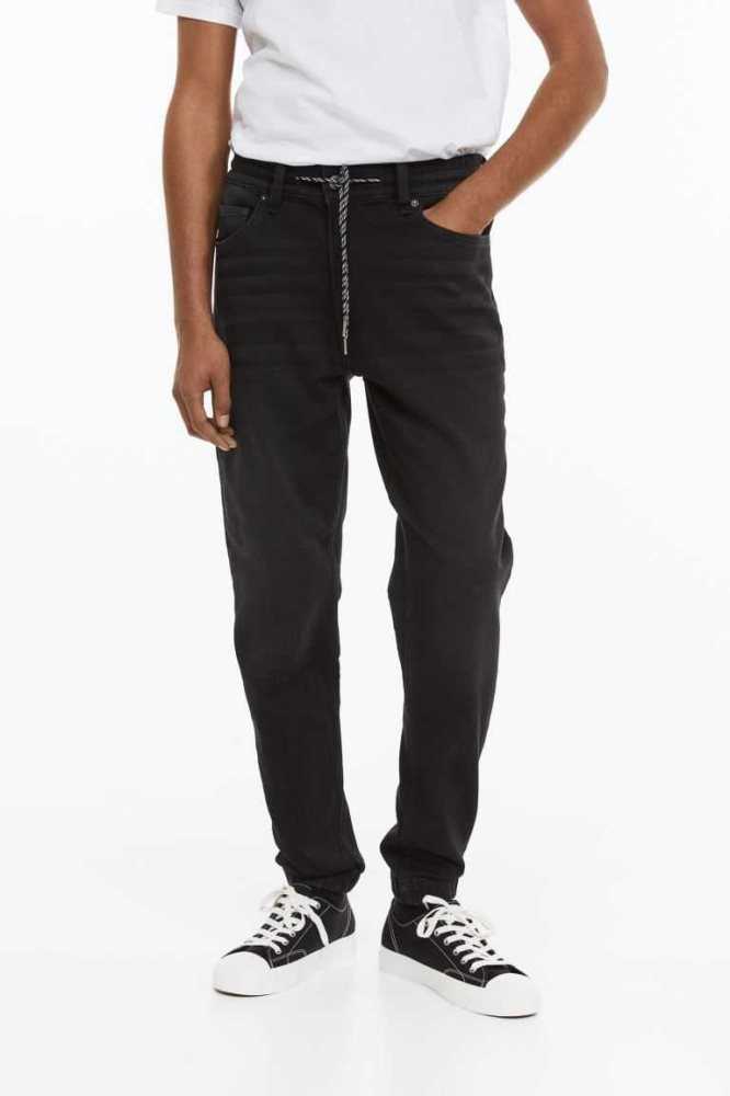 Pantalones H&M Híbrido Regular Tapered Joggers Hombre Negros | 635407OKE